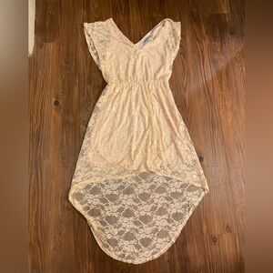 Light baby pink sundress with lace on the outside. Size S